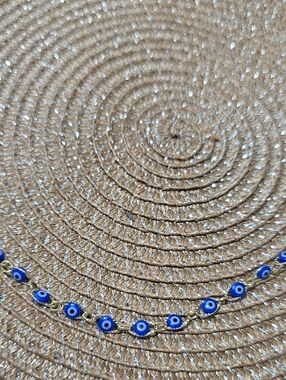 Gold-Tone Bracelet with Blue Eye Beads